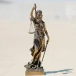 Decorative image (Lady Justice holding scales and sword)